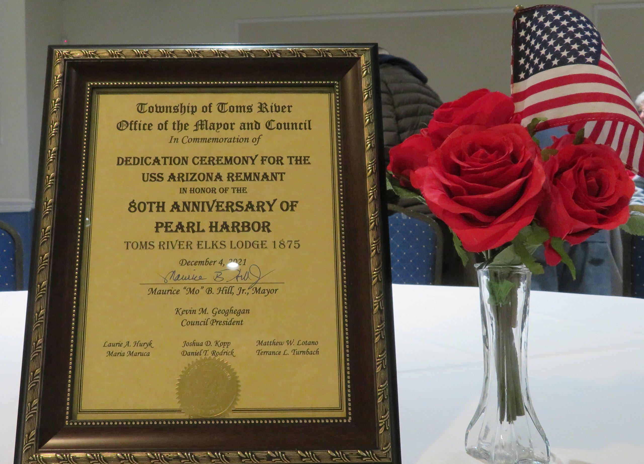 photo of dedication plaque from USS Arizona Remnant