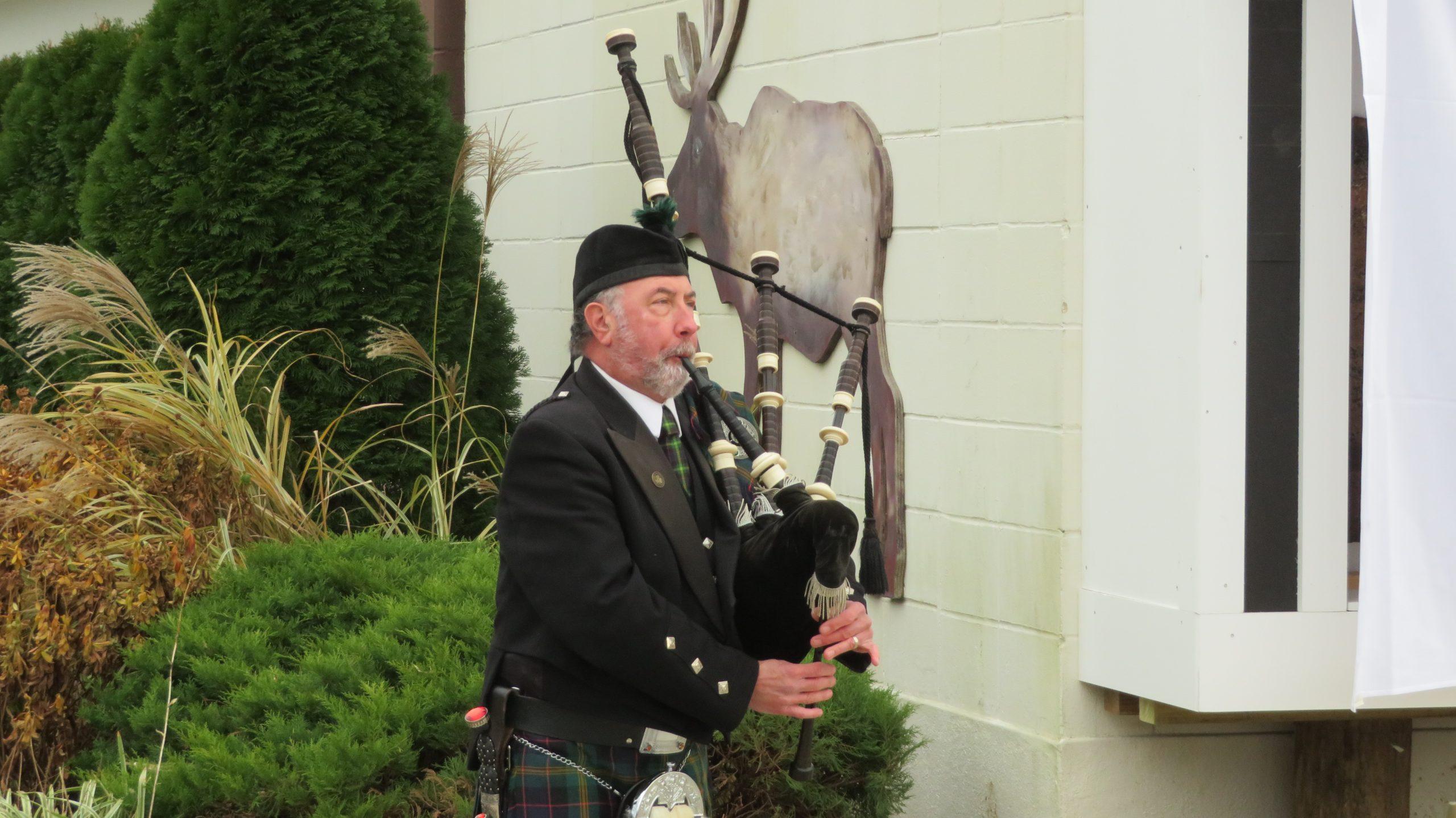 photo of bagpiper from USS Arizona Remnant